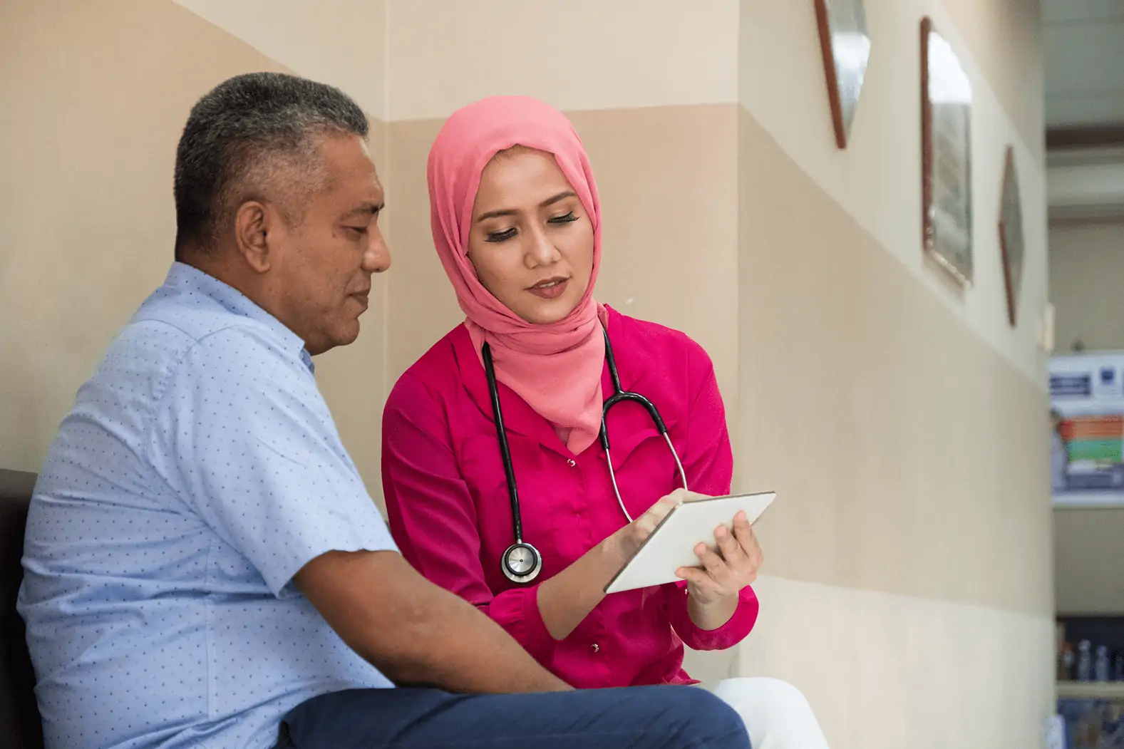 Nurse explaining to patient