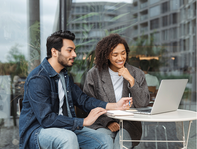 Woman looking at laptop